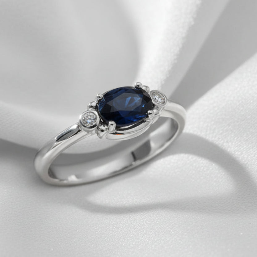 9ct White Gold Oval Sapphire & Diamond Ring - Size N