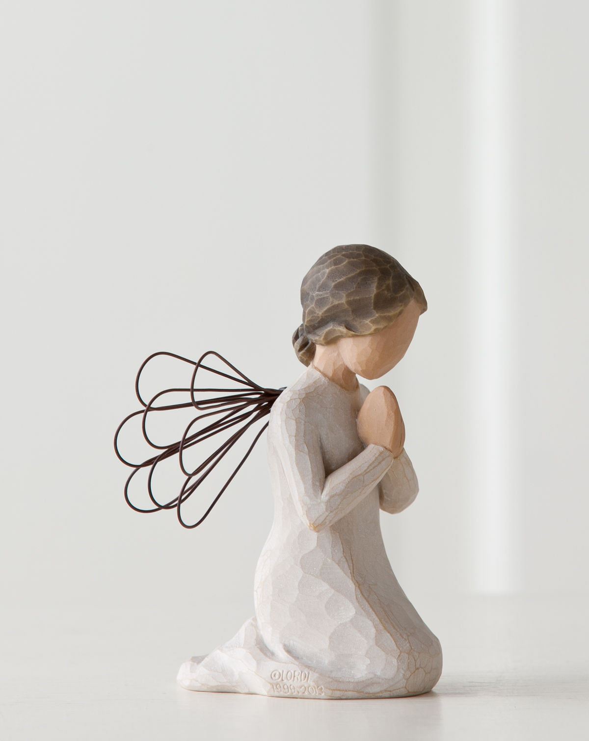 Willow Tree 'Angel of Prayer' Figurine shows an angel on their knees, with hands together as if praying. Figurine Height Approx: 11cm.