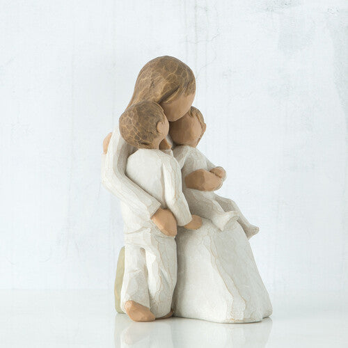 Willow Tree 'Quietly' Figurine. A seated mother holding one young child with another child standing beside her.
