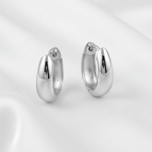 Sterling Silver Oval Tapered Huggie Earrings