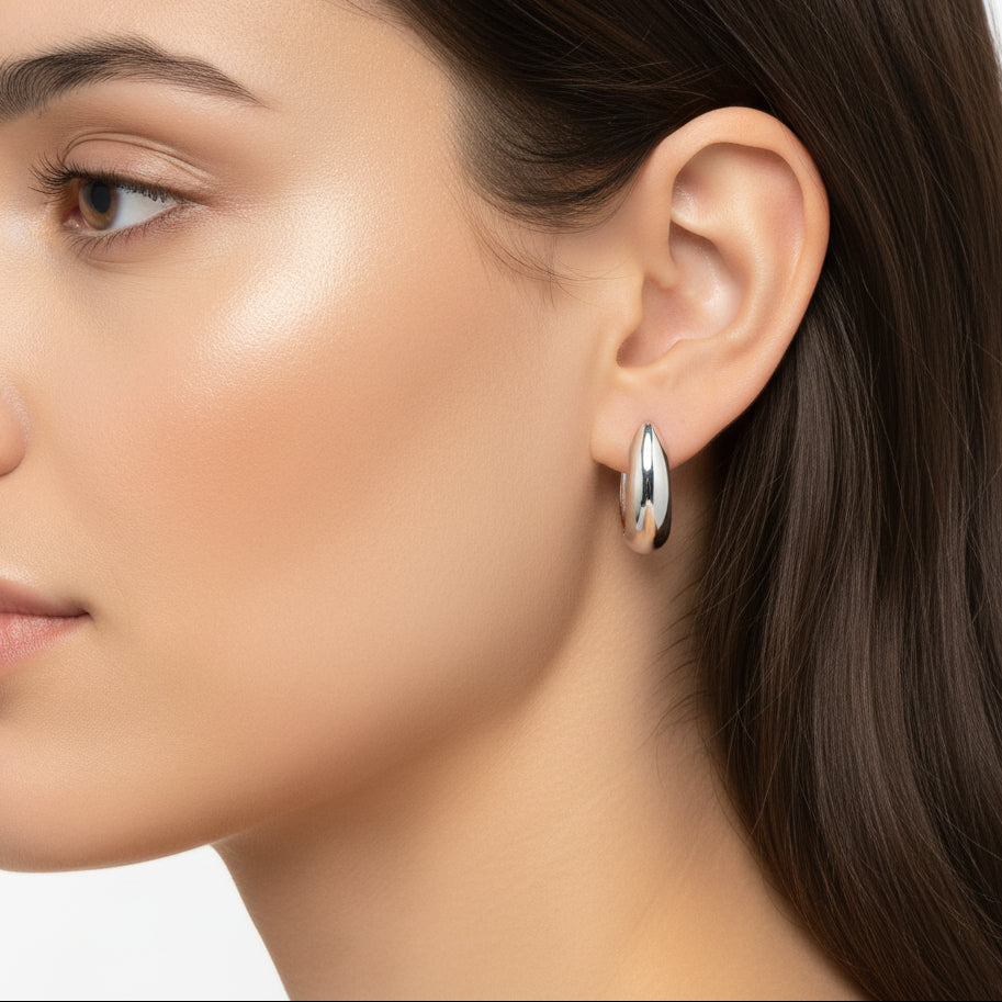 Sterling Silver Oval Tapered Huggie Earrings