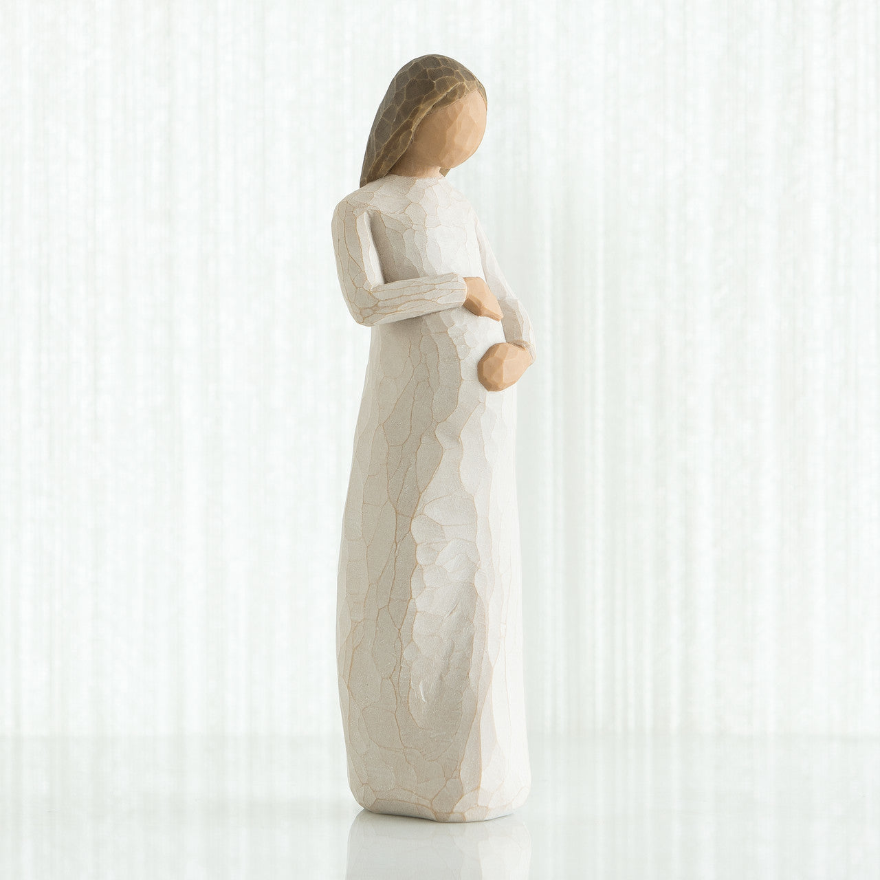 Willow Tree 'Cherish' figurine. Figurine depicts a pregnant woman gently holding her belly. Figurine Height Approx: 21cm.