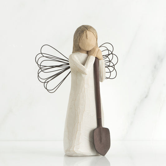 Willow Tree 'Angel of the Garden' Figurine depicts an angel figure holding a shovel as if leaving on it. Figurine Height Approx: 13cm.