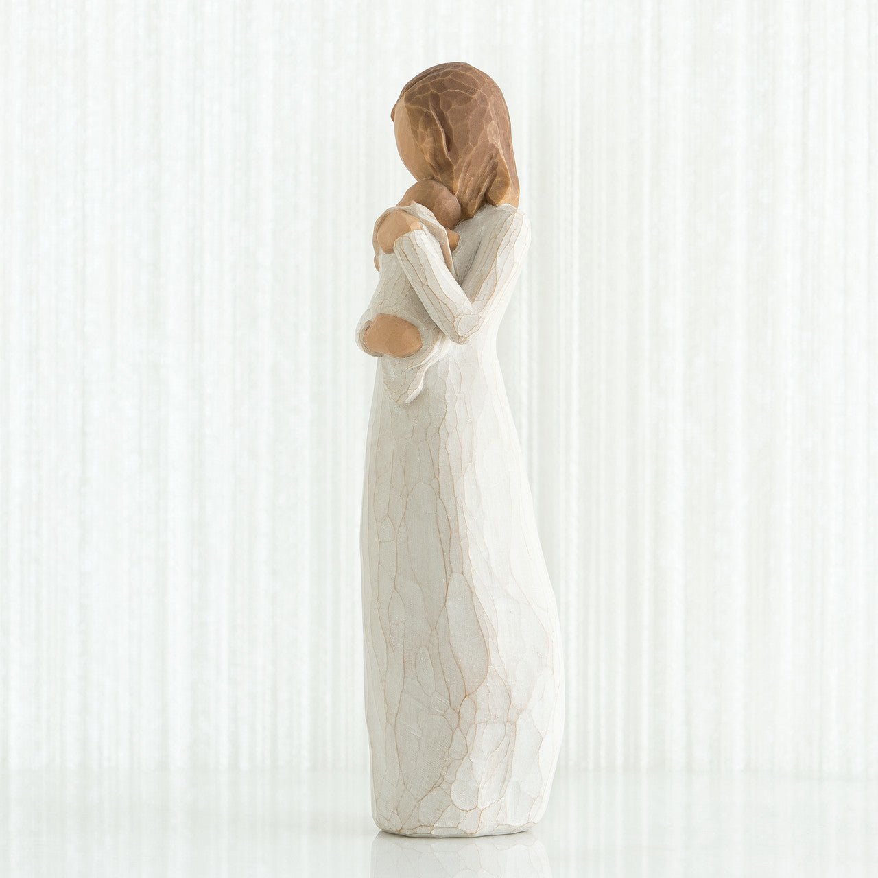 Willow Tree 'Angel Of Mine' Figurine Depicts a mother holding baby against her cheek. Figurine Height Approx: 22cm.