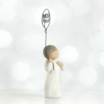 Willow Tree 'Miss You' Figurine. A figure holding a wire balloon with the words miss you within it.