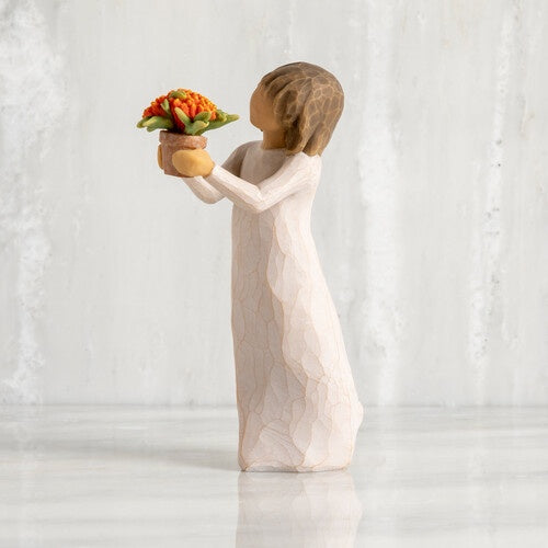 Willow Tree 'Little Things' Figurine. A young girl holding out a flower pot full of orange flowers.