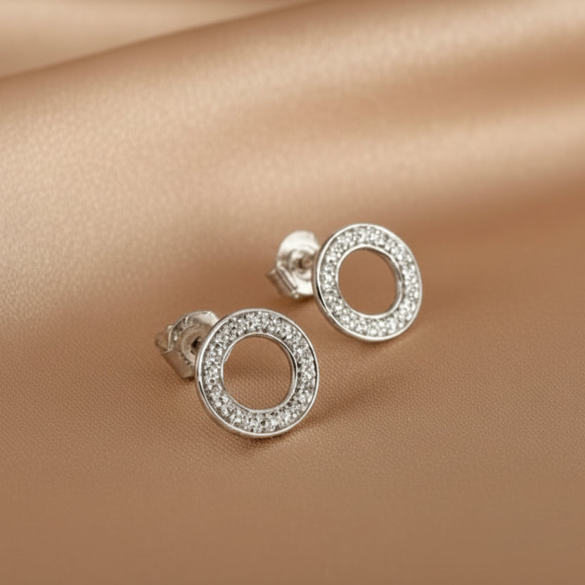 9ct white gold open circle stud earrings set with diamonds.