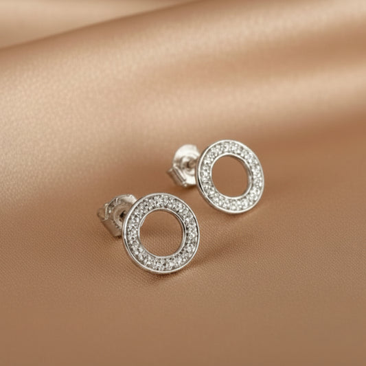 9ct white gold open circle stud earrings set with diamonds.