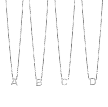 Sterling silver necklace with petite attached initial. Length: 42 + 3cm extender. Initial Size Approx: 5mm.